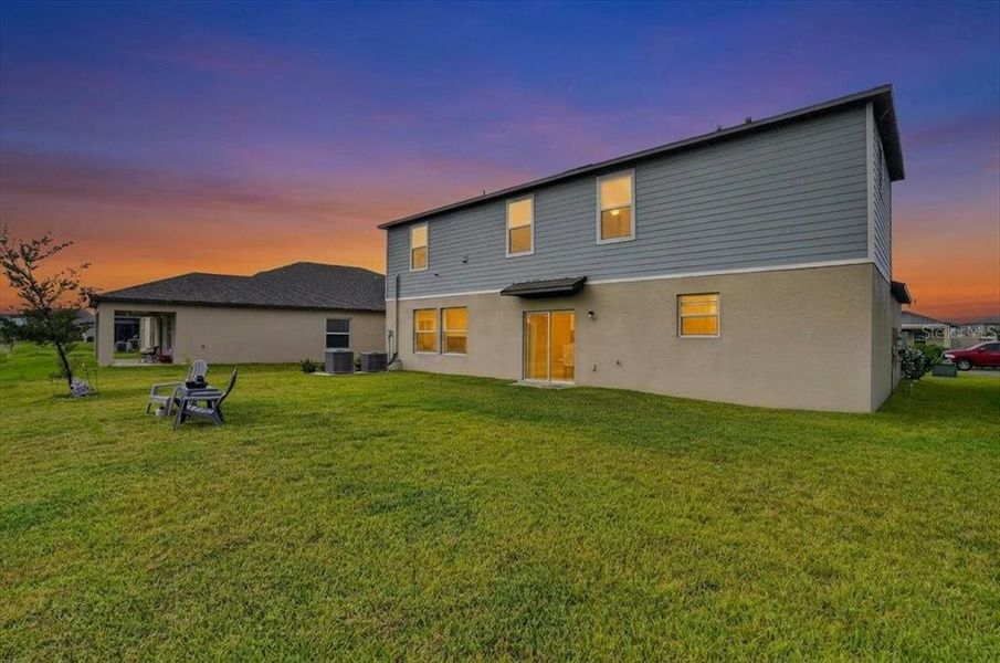 Exterior details and patio area of a home in Prosperity Lakes, Parrish (Image 20).