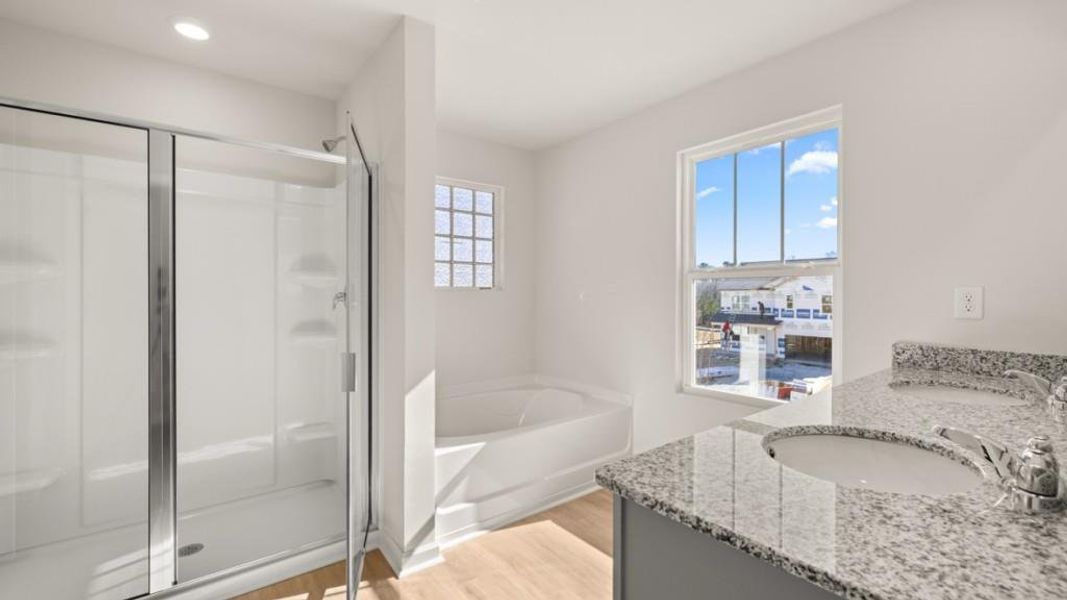 Furnished interior view inside a new home in Northwoods at Mirror Lake, Villa Rica (Image 3).