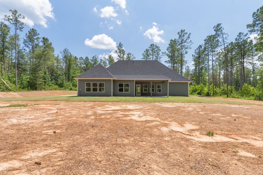 Front exterior of a new home in Stewart Estates, Meansville, GA, highlighting curb appeal (Image 24).