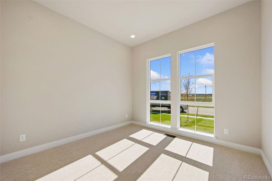 Spacious, unfurnished interior of a new home in Kitchel Lake at Serratoga Falls, Timnath (Image 10).