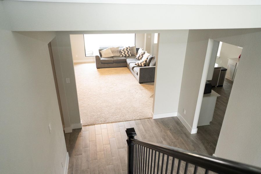 Spacious, unfurnished interior of a new home in Sunterra, Katy (Image 26).