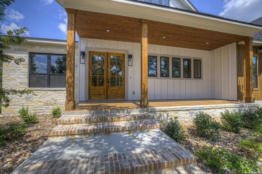 Exterior details and patio area of a home in , Spring Branch (Image 3). Exterior details and patio area of a home in , Spring Branch (Image 3).