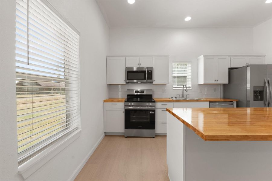 Furnished interior view inside a new home in , Point Blank (Image 6).
