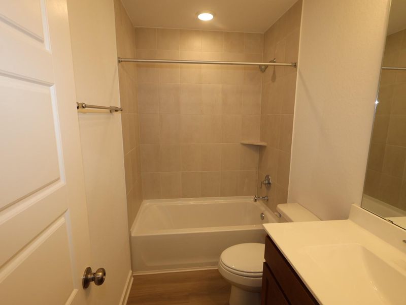 Furnished interior view inside a new home in Pinewood at Grand Texas, New Caney (Image 8).