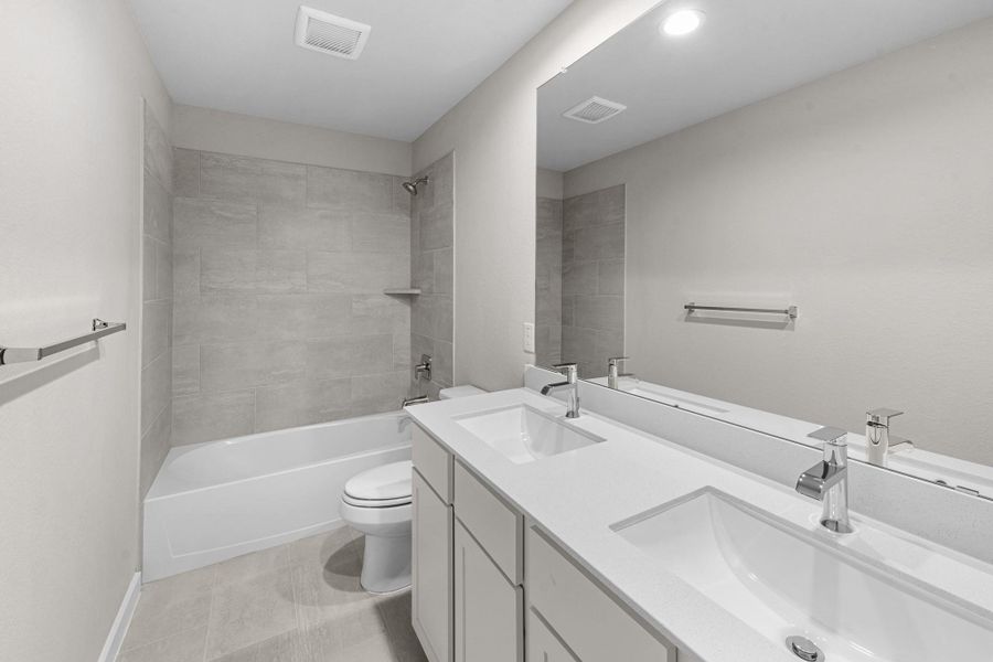 Furnished interior view inside a new home in Barton Creek Ranch, Conroe (Image 12).