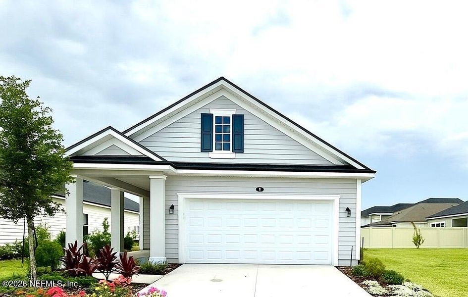 Front exterior of a new home in , St. Augustine, FL, highlighting curb appeal (Image 1). Front exterior of a new home in , St. Augustine, FL, highlighting curb appeal (Image 1).