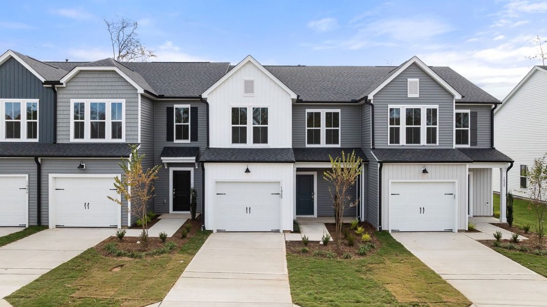 Front exterior of a new home in Poets Walk, Whitsett, NC, highlighting curb appeal (Image 18).
