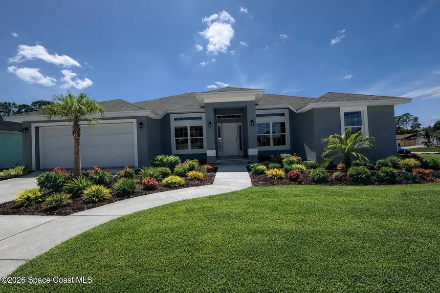 Front exterior of a new home in Palm Bay, Palm Bay, FL, highlighting curb appeal (Image 1). Front exterior of a new home in Palm Bay, Palm Bay, FL, highlighting curb appeal (Image 1).
