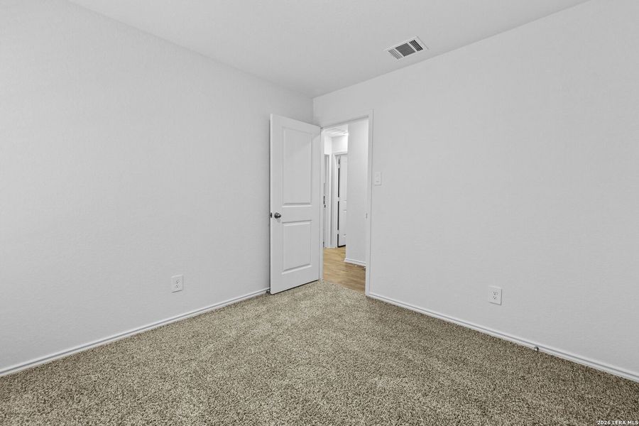 Spacious, unfurnished interior of a new home in Hickory Ridge, Elmendorf (Image 31).