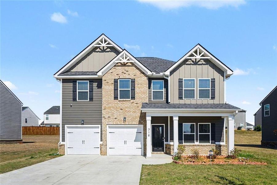 Front exterior of a new home in , Covington, GA, highlighting curb appeal (Image 1). Front exterior of a new home in , Covington, GA, highlighting curb appeal (Image 1).