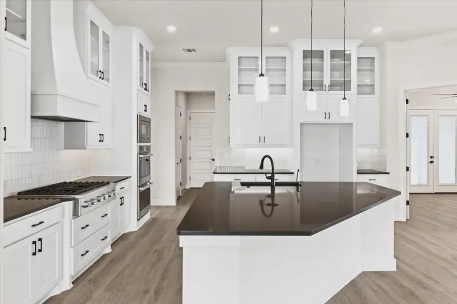 Representative furnished interior of a home built from the Vienna II by Chesmar Homes in The Vines, Haslet (Image 6). Representative furnished interior of a home built from the Vienna II by Chesmar Homes in The Vines, Haslet (Image 6).