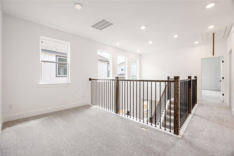 Spacious, unfurnished interior of a new home in Ryegrass Collection – Freedom at Anthem, Kyle (Image 18).