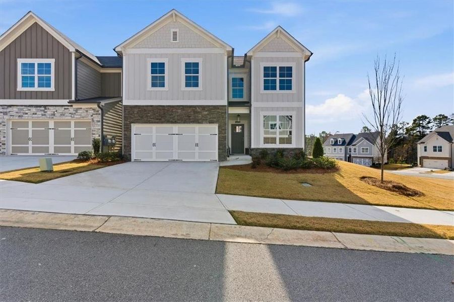 Front exterior of a new home in Lakeside at Great Sky, Canton, GA, highlighting curb appeal (Image 22).