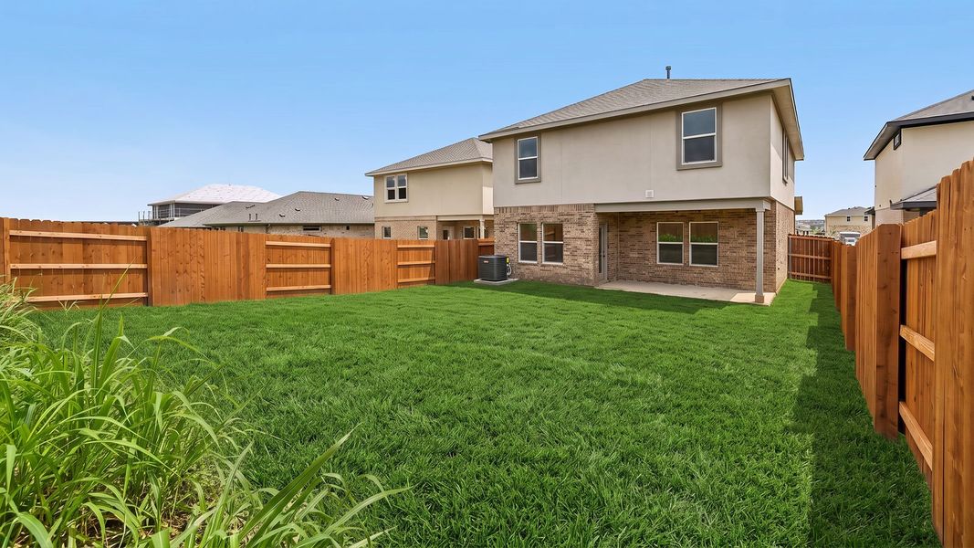 Exterior details and patio area of a home in Bar W Ranch, Leander (Image 23).