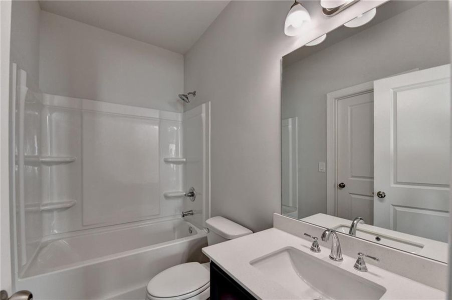 Furnished interior view inside a new home in , Suwanee (Image 17).