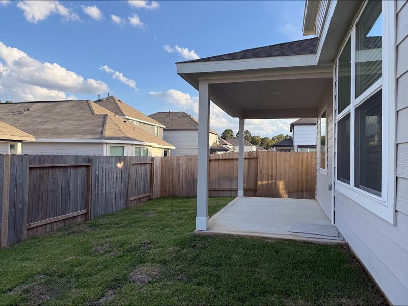 Exterior details and patio area of a home in River's Edge, Conroe (Image 3). Exterior details and patio area of a home in River's Edge, Conroe (Image 3).