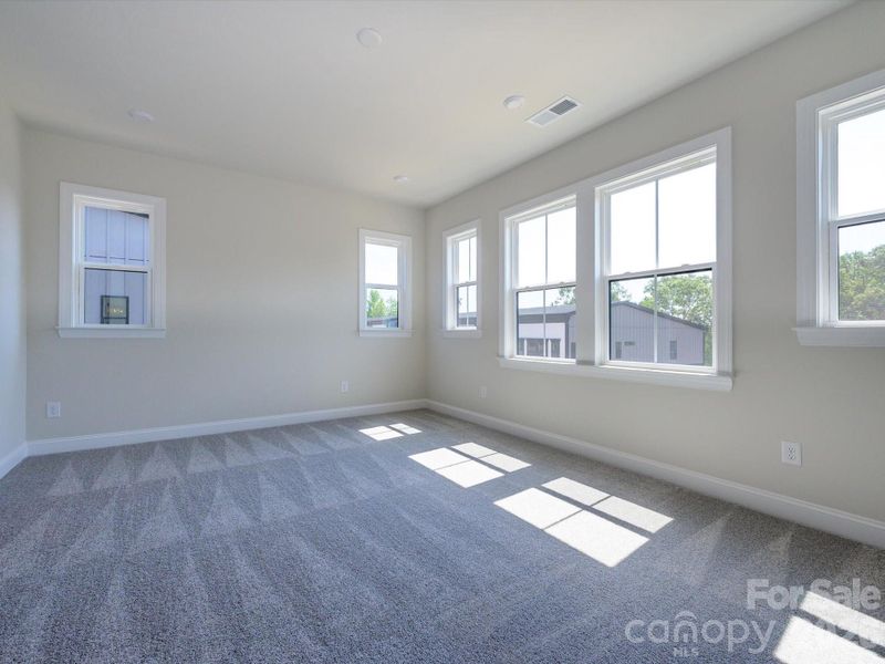 Light filled primary bedroom