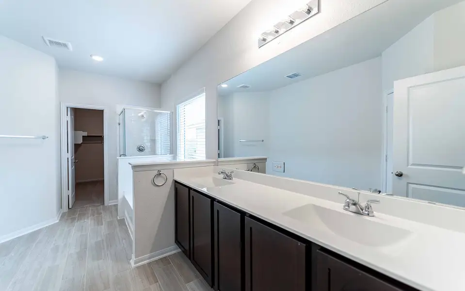 Furnished interior view inside a new home in Hunter's Ranch, San Antonio (Image 7).