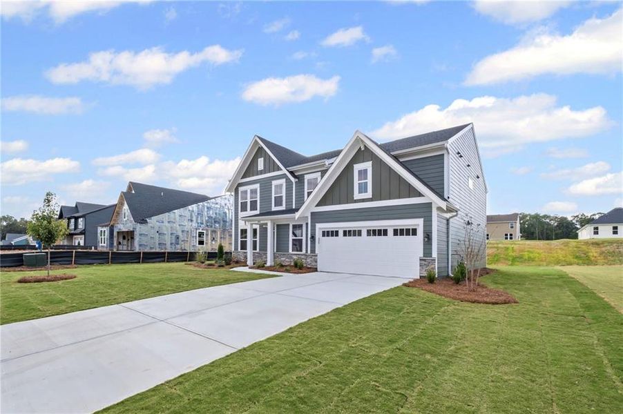 Front exterior of a new home in Pickens Bluff, Hiram, GA, highlighting curb appeal (Image 17).