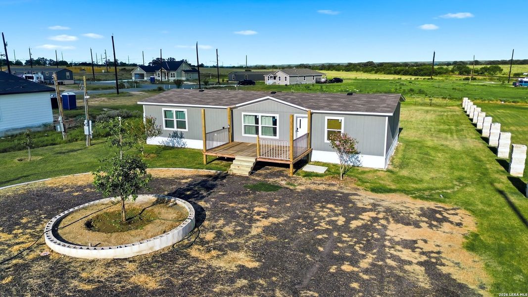 Exterior details and patio area of a home in , Atascosa (Image 22).