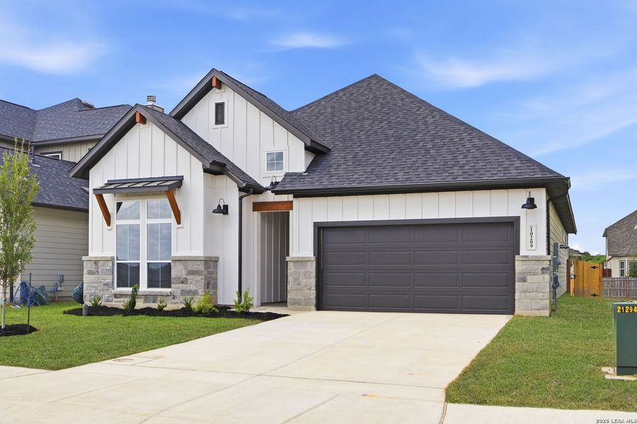 Front exterior of a new home in Rhine Valley, Schertz, TX, highlighting curb appeal (Image 2). Front exterior of a new home in Rhine Valley, Schertz, TX, highlighting curb appeal (Image 2).