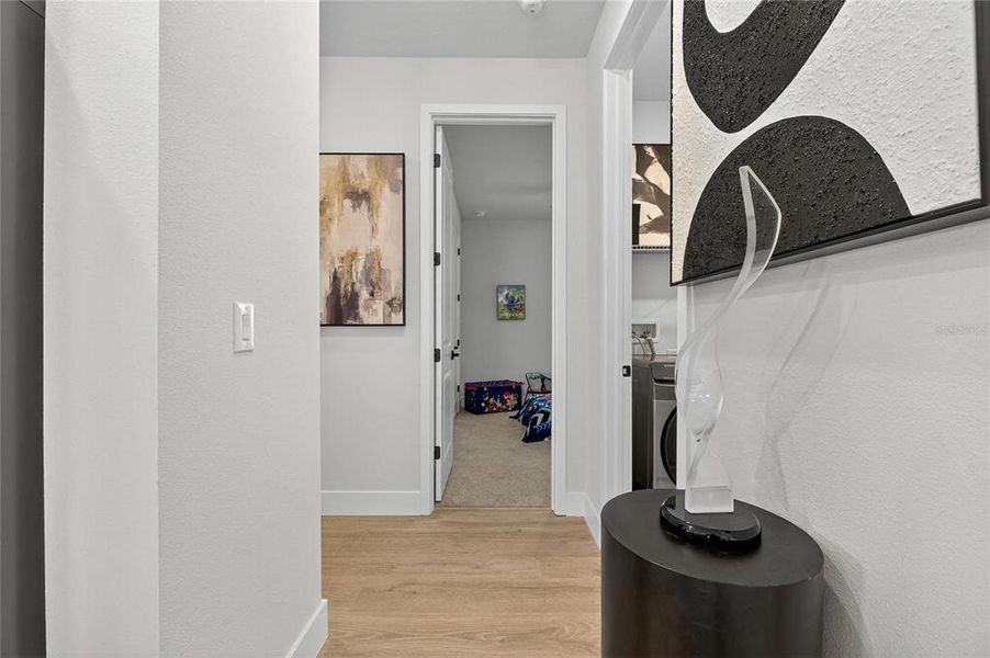 Furnished interior view inside a new home in The Peninsula at Rhodine Lake, Riverview (Image 29).