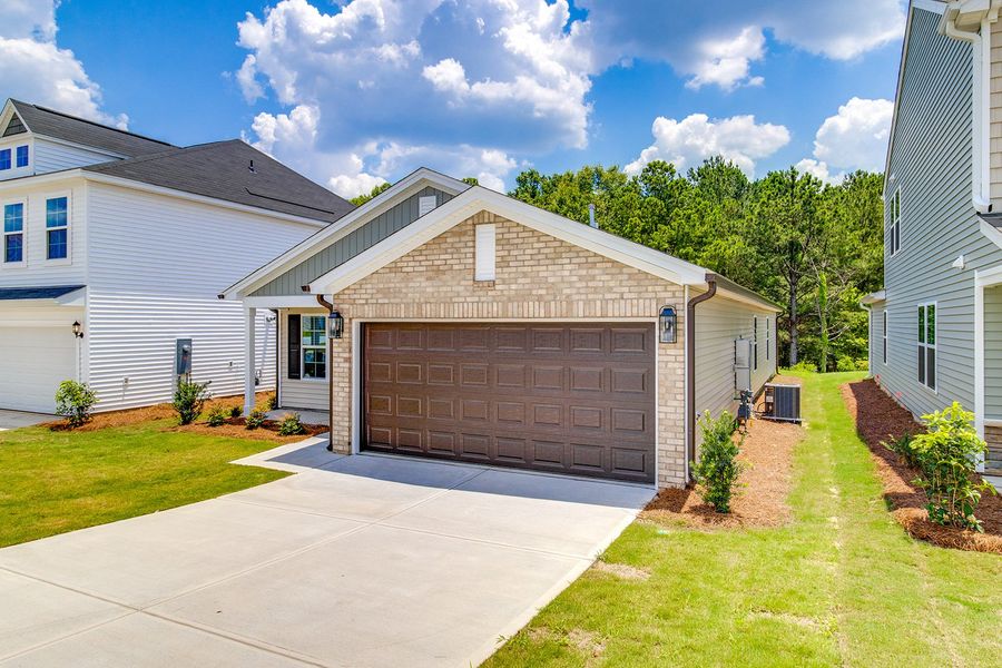 Front exterior of a new home in Bluefield, Lexington, SC, highlighting curb appeal (Image 2). Front exterior of a new home in Bluefield, Lexington, SC, highlighting curb appeal (Image 2).