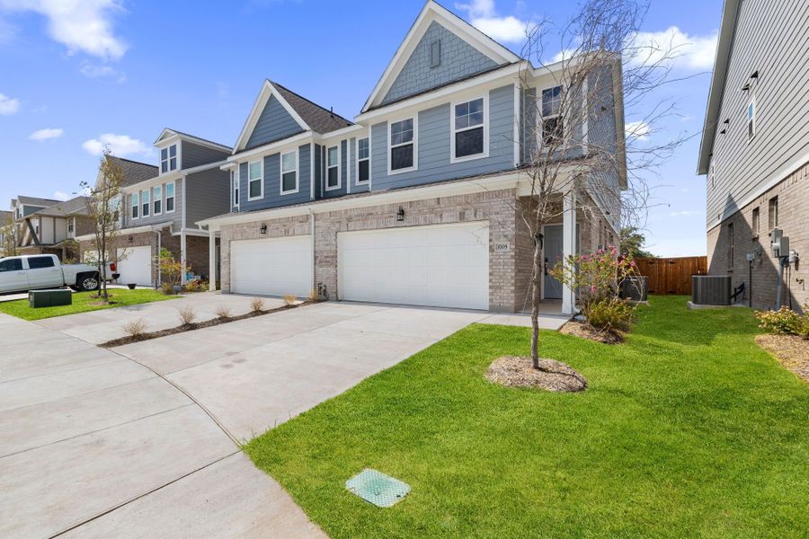 Front exterior of a new home in Lake Park Villas, Wylie, TX, highlighting curb appeal (Image 52).