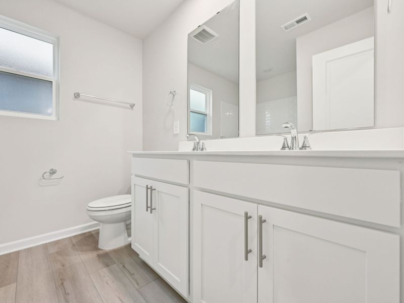 Furnished interior view inside a new home in Oak Manor - Classic Series, Garner (Image 7). Furnished interior view inside a new home in Oak Manor - Classic Series, Garner (Image 7).