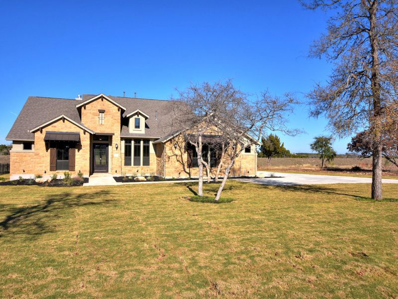 Representative exterior photo of a completed home built from the San Simeon I by Giddens Homes in Clearwater Ranch, Liberty Hill, TX (Image 50).