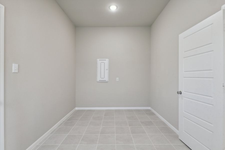 Utility Room in the Diamond home plan by Trophy Signature Homes – REPRESENTATIVE PHOTO