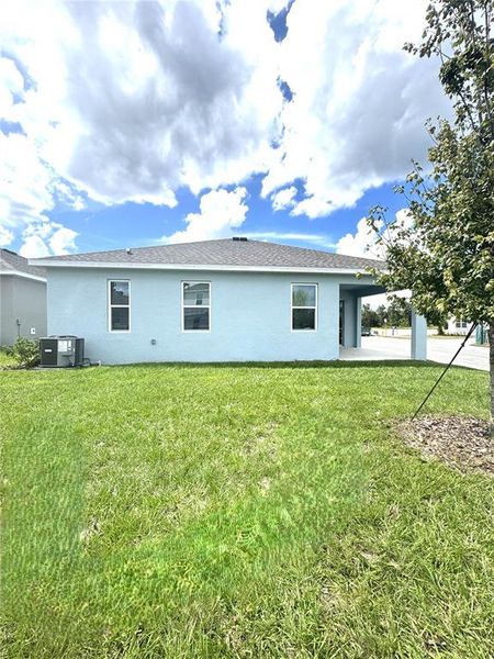 Exterior details and patio area of a home in Trinity Gardens, Deland (Image 2).