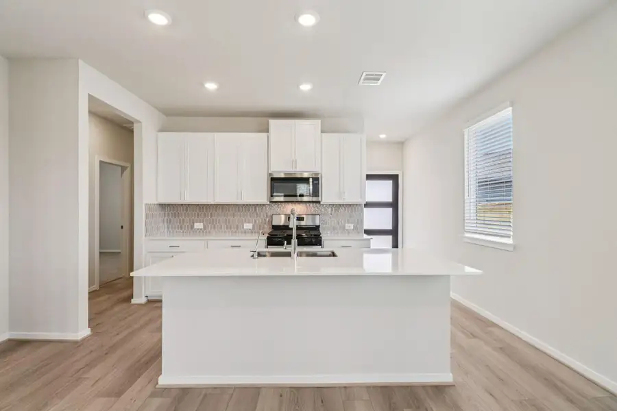 Photo is not of the actual home, but is an inspirational photo of builder’s model home and may depict options, furnishings, and/or decorator features that are not included