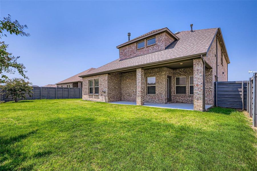 Front exterior of a new home in , Little Elm, TX, highlighting curb appeal (Image 1).