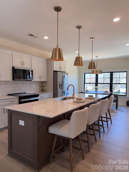 Furnished interior view inside a new home in , Huntersville (Image 9).