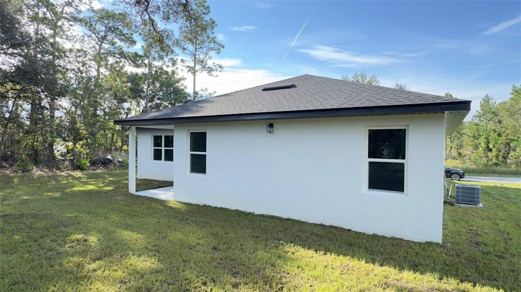 Front exterior of a new home in , Citrus Springs, FL, highlighting curb appeal (Image 20). Front exterior of a new home in , Citrus Springs, FL, highlighting curb appeal (Image 20).
