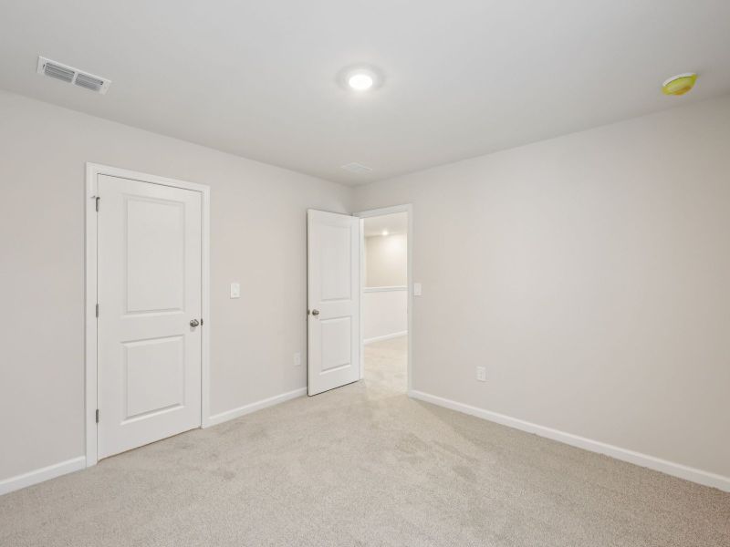Spacious, unfurnished interior of a new home in Northwoods at Mirror Lake, Villa Rica (Image 16).