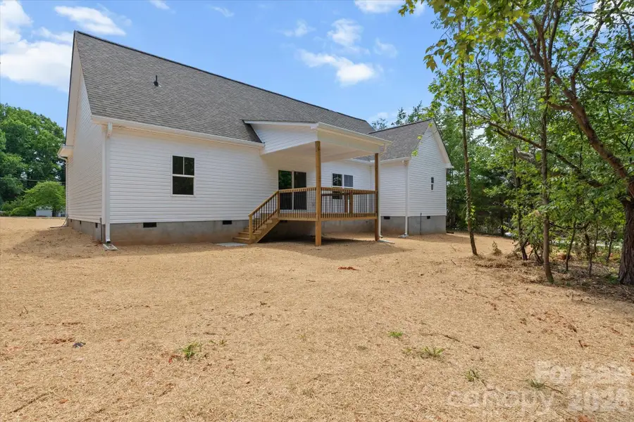 Exterior details and patio area of a home in , Troutman (Image 19).