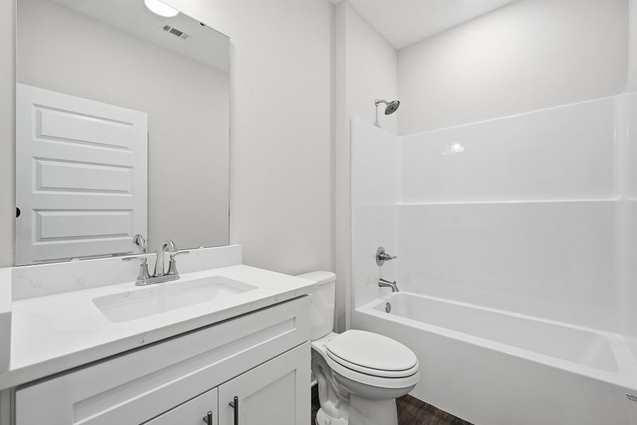 Furnished interior view inside a new home in Southern Charm, Crestview (Image 17).