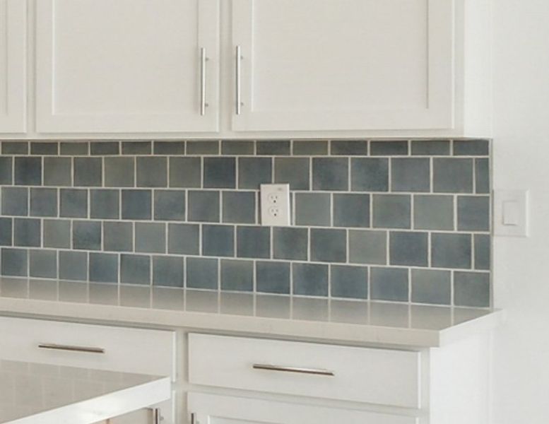 Not actual home - Coastal Collection finishes - Kitchen backsplash detail