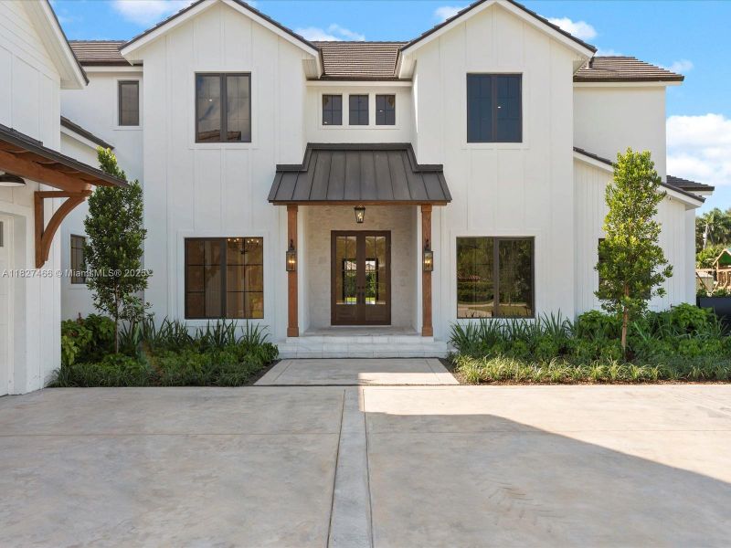 Front exterior of a new home in , Miami, FL, highlighting curb appeal (Image 25).