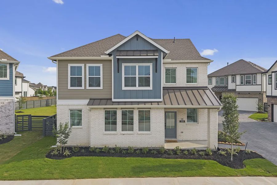 Front exterior of a new home in Bridgeland Courtyard, Cypress, TX, highlighting curb appeal (Image 16).
