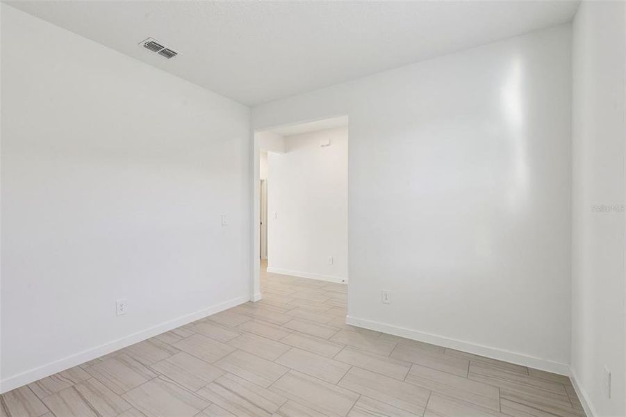 Spacious, unfurnished interior of a new home in Colbert Landings, Palm Coast (Image 11).