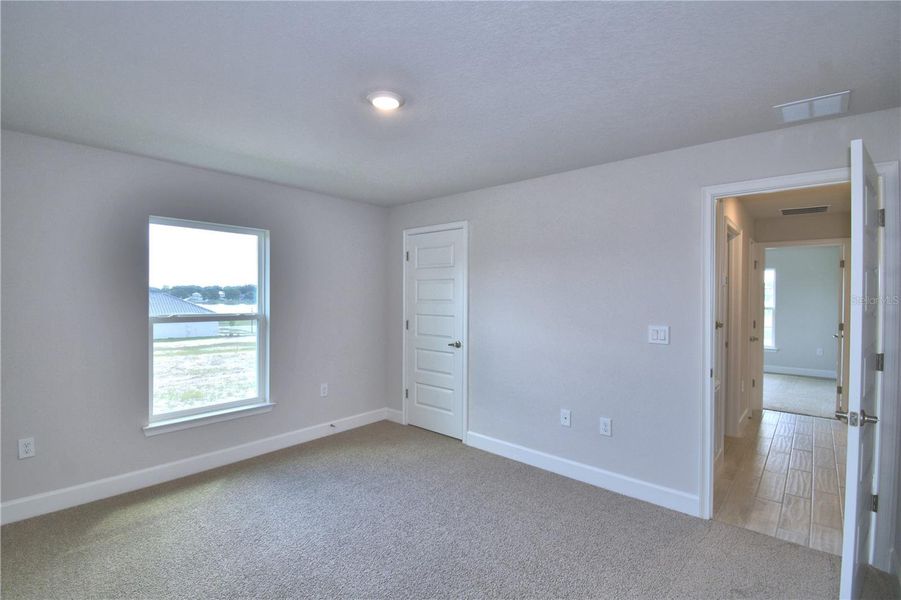 Spacious, unfurnished interior of a new home in Lake Juliana Estates, Auburndale (Image 27).