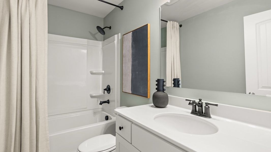 Representative furnished interior of a home built from the GRAYSON by D.R. Horton in Haven Abbey, Cumming (Image 66).