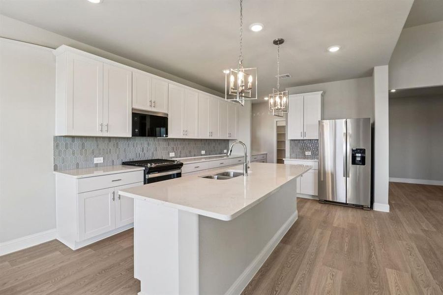 Photo is not of the actual home, but is an inspirational photo of builder’s model home and may depict options, furnishings, and/or decorator features that are not included.