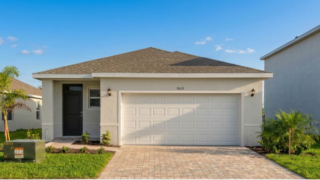 Front exterior of a new home in Venetian Grove, Vero Beach, FL, highlighting curb appeal (Image 1). Front exterior of a new home in Venetian Grove, Vero Beach, FL, highlighting curb appeal (Image 1).