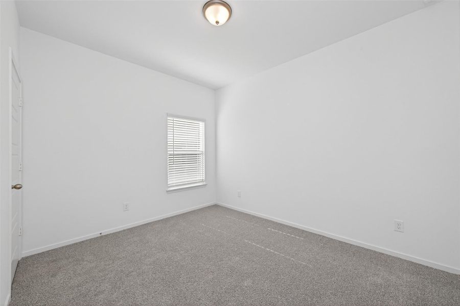 Spacious, unfurnished interior of a new home in Enclave at Willis, Willis (Image 29).