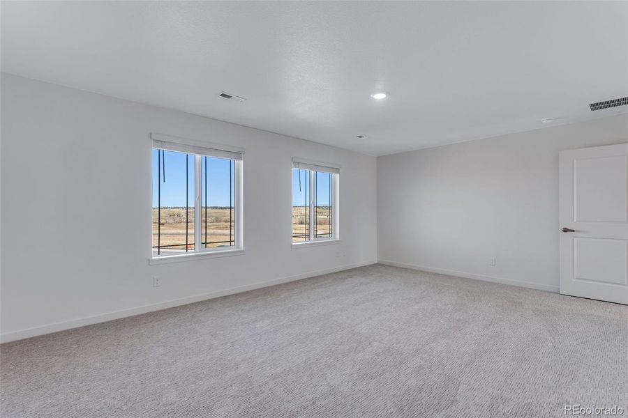 Spacious, unfurnished interior of a new home in Trails at Crowfoot, Parker (Image 26).