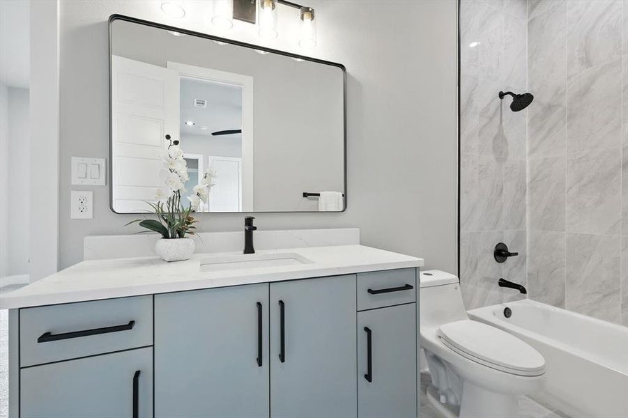 Bathroom with vanity and bathtub / shower combination Bathroom with vanity and bathtub / shower combination